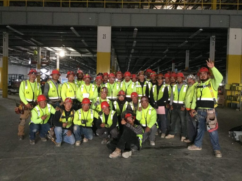 An image of the construction team at a site posing together