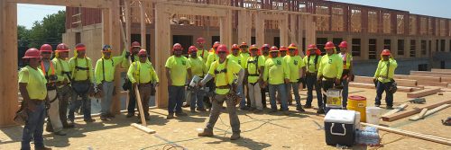 an image of a group of the LB Construction workers posing for a photograph at one of their job sites