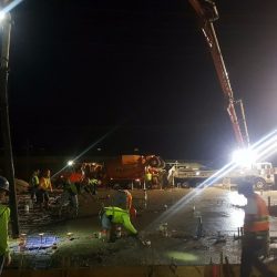 An image of a working construction crew